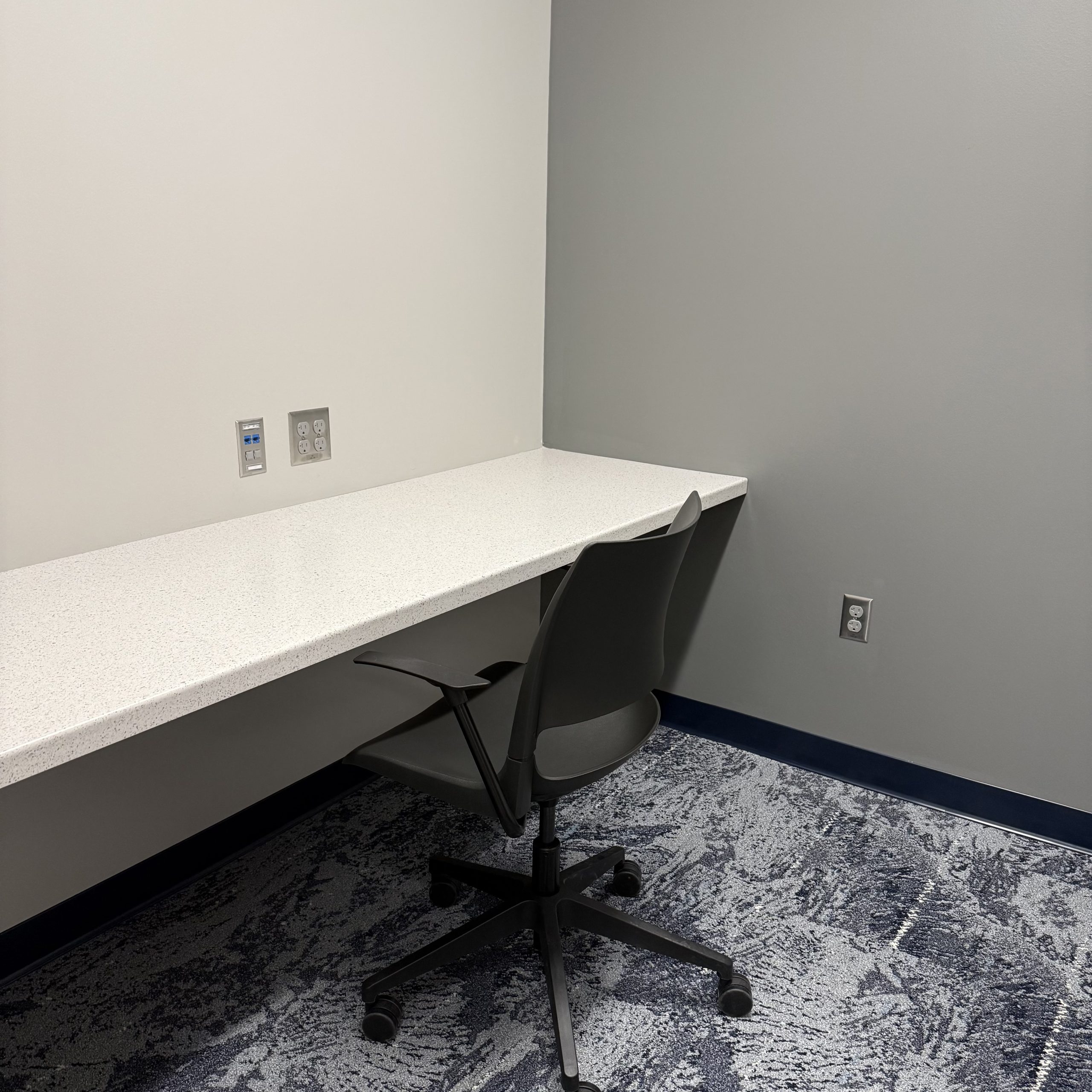 study room with desk chair and counter