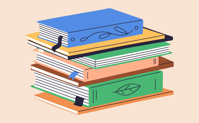 A stack of colorful books with decorative designs and bookmarks.