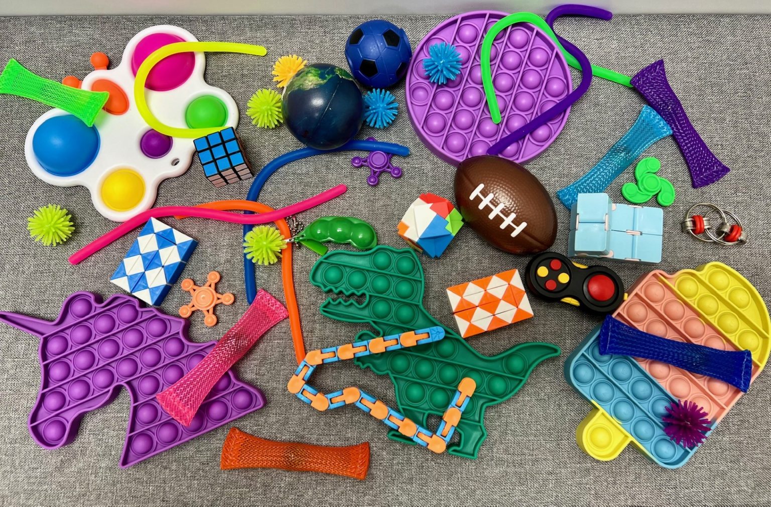 Fidget toys displayed on a carpet