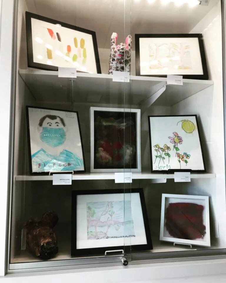 Example of a window display of an artists drawings